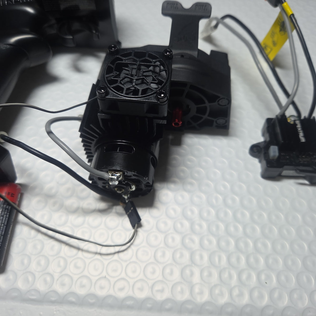 ARRMA Granite MEGA brushed motor power module close up