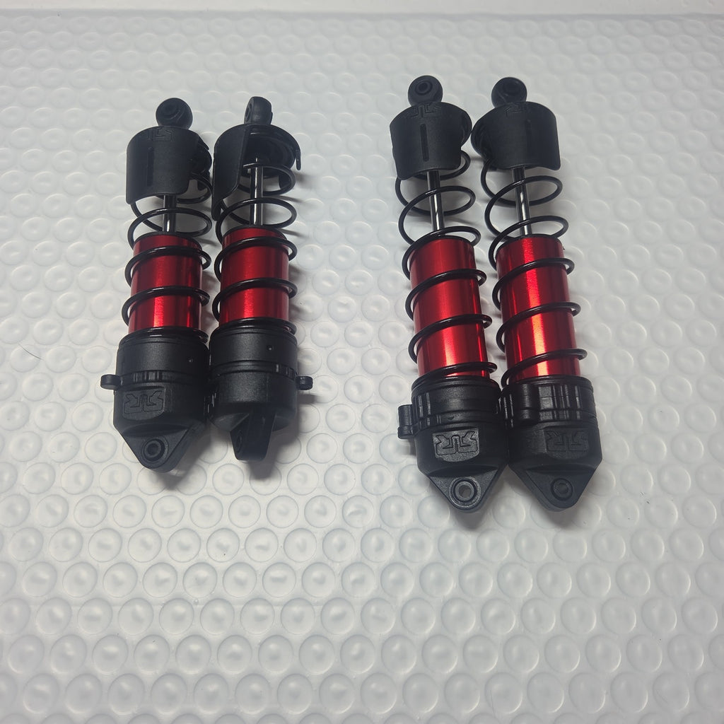 ARRMA Outcast 4S front and rear shocks reverse view new takeoff