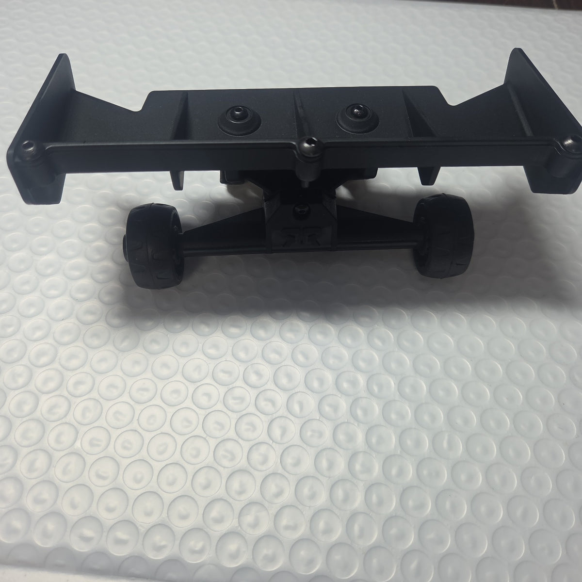 ARRMA Outcast 4S rear wing and wheelie bar assembly new takeoff