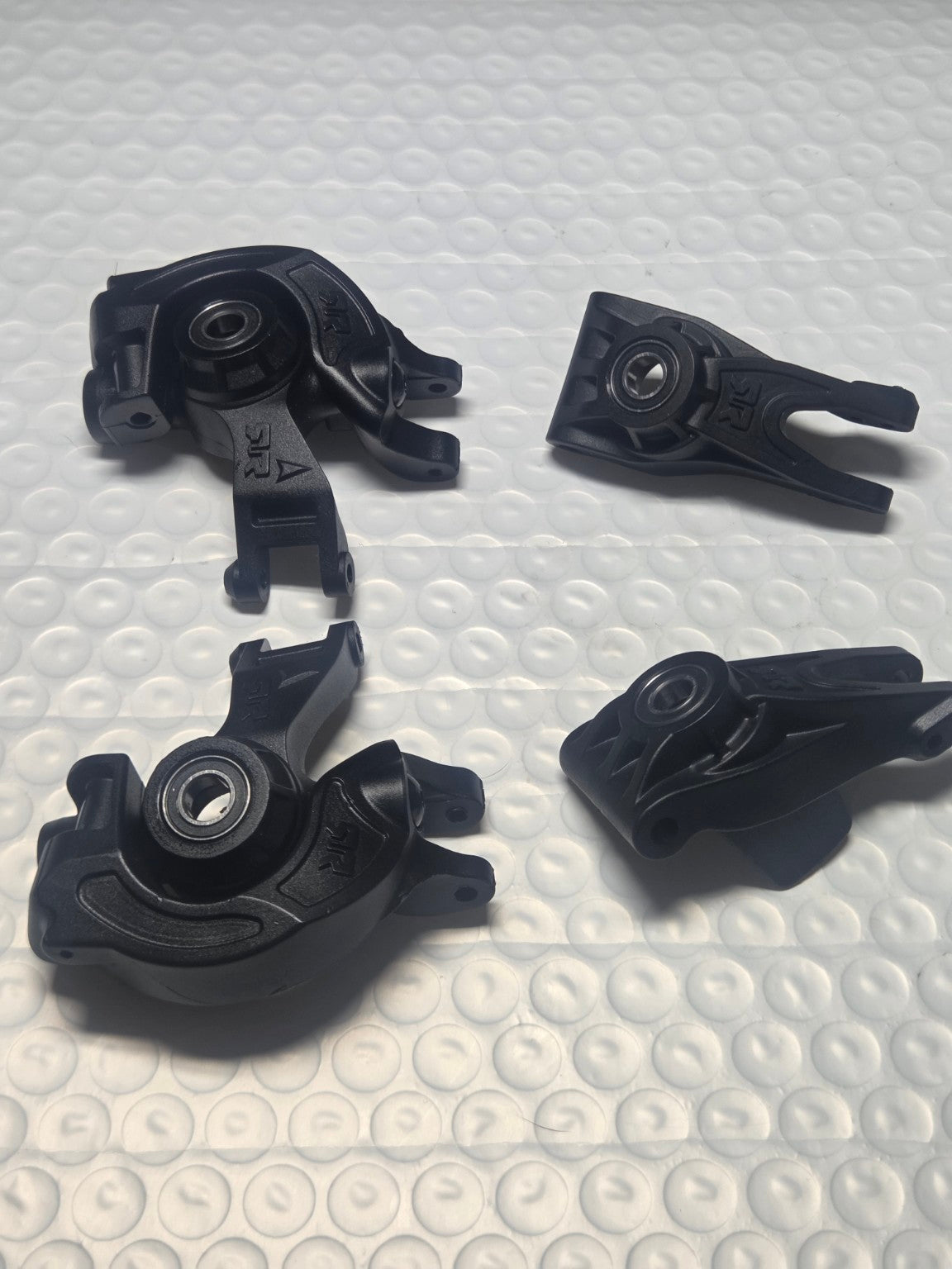 ARRMA Big Rock 223S front and rear hub bearing carriers with bearings