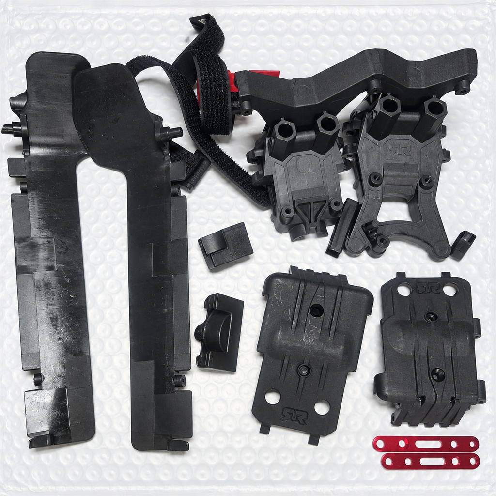 ARRMA Big Rock 3S BLX chassis parts lot close view